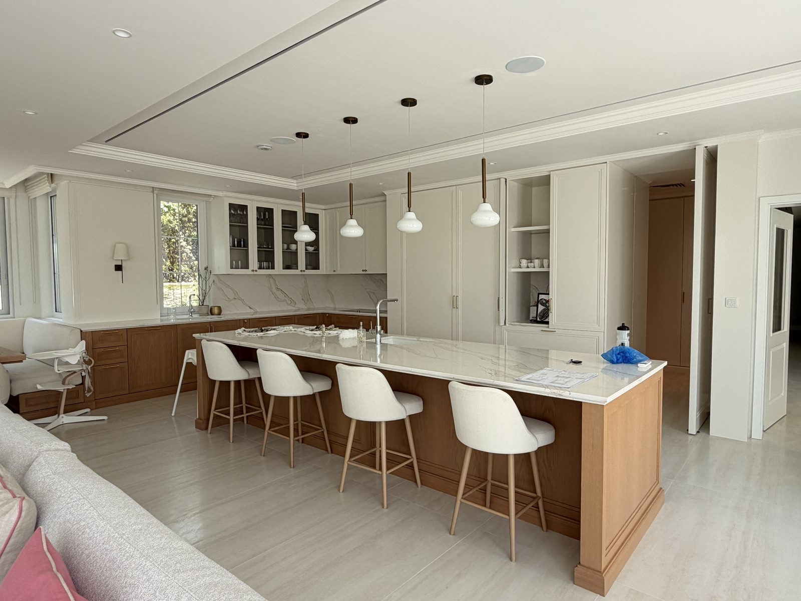 Kitchen — island relocated, floor tiles replaced